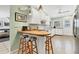 Updated kitchen with white cabinets and butcher block countertops at 616 Lyons Ln, Longboat Key, FL 34228