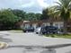 Exterior view of condo building and parking lot at 6177 Chesham Dr # 5, New Port Richey, FL 34653