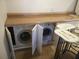 Laundry closet with a washer and dryer at 6177 Chesham Dr # 6, New Port Richey, FL 34653