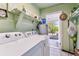 Bright laundry room with washer, dryer, and exterior access at 7318 Filbert Ln, Tampa, FL 33637