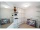 Large walk-in closet with wire shelving and mirrored doors at 7902 Sailboat Key S Blvd # 405, South Pasadena, FL 33707