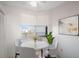 Small dining area with a round table and four chairs at 7902 Sailboat Key S Blvd # 405, South Pasadena, FL 33707