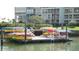 Community kayak launch with many kayaks at 7902 Sailboat Key S Blvd # 405, South Pasadena, FL 33707