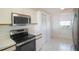 Kitchen with stainless steel appliances and ample storage at 7902 Sailboat Key S Blvd # 405, South Pasadena, FL 33707
