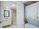 Stackable washer and dryer in a well-lit laundry closet at 7902 Sailboat Key S Blvd # 405, South Pasadena, FL 33707