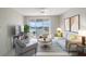 Living room with water view, comfy seating and modern decor at 7902 Sailboat Key S Blvd # 405, South Pasadena, FL 33707