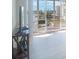 Living room with sliding doors to balcony and water views at 7902 Sailboat Key S Blvd # 405, South Pasadena, FL 33707