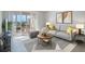 Living room with water view, comfy seating, and modern decor at 7902 Sailboat Key S Blvd # 405, South Pasadena, FL 33707
