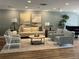 Elegant lobby with comfortable seating and grand piano at 7902 Sailboat Key S Blvd # 405, South Pasadena, FL 33707