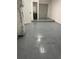 Garage with epoxy floor and extra storage at 8239 Brentwood Rd # 8239, Seminole, FL 33777