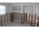 Unfinished bathroom with exposed framing and plumbing at 215 176Th Terrace E Dr, Redington Shores, FL 33708