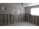 Under renovation: bedroom with tiled floors and exposed walls at 215 176Th Terrace E Dr, Redington Shores, FL 33708
