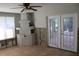 Renovation project: dining room with fireplace and French doors at 215 176Th Terrace E Dr, Redington Shores, FL 33708