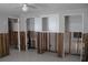A kitchen needing renovation, featuring damaged walls and exposed framing at 215 176Th Terrace E Dr, Redington Shores, FL 33708