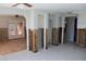 Large living area with French doors and exposed walls at 215 176Th Terrace E Dr, Redington Shores, FL 33708