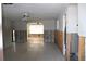 Under renovation: living room features tiled floors and exposed walls at 215 176Th Terrace E Dr, Redington Shores, FL 33708