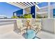 Relaxing balcony with seating area and pergola at 226 5Th N Ave # 1502, St Petersburg, FL 33701