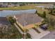 Two-car garage, and a view of the golf course at 2311 Nottingham Greens Dr # 2311, Sun City Center, FL 33573