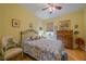 Charming bedroom with ceiling fan and hardwood floors at 2311 Nottingham Greens Dr # 2311, Sun City Center, FL 33573