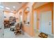 Home hallway with access to office and other rooms at 2311 Nottingham Greens Dr # 2311, Sun City Center, FL 33573