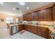 Modern kitchen featuring ample cabinetry and stainless steel appliances at 2311 Nottingham Greens Dr # 2311, Sun City Center, FL 33573
