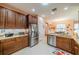 Eat-in kitchen with stainless steel appliances and granite countertops at 2311 Nottingham Greens Dr # 2311, Sun City Center, FL 33573