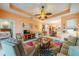 Open living area with views into kitchen and bedroom at 2311 Nottingham Greens Dr # 2311, Sun City Center, FL 33573