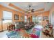 Bright living room with comfy seating and a colorful rug at 2311 Nottingham Greens Dr # 2311, Sun City Center, FL 33573