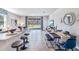 Open concept kitchen with island, granite countertops, and stainless steel appliances at 32619 Turtle Grace Loop, Wesley Chapel, FL 33545