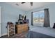 Bedroom with double bed, dresser and ceiling fan at 4825 Dr Martin Luther King Jr S St, St Petersburg, FL 33705