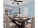 Dining room with a large wooden table and six chairs at 4825 Dr Martin Luther King Jr S St, St Petersburg, FL 33705