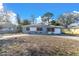 House front with driveway and solar panels at 4825 Dr Martin Luther King Jr S St, St Petersburg, FL 33705