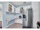 Kitchen with stainless steel refrigerator and microwave at 4825 Dr Martin Luther King Jr S St, St Petersburg, FL 33705