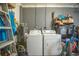 Laundry room with washer, dryer, and extra storage at 4825 Dr Martin Luther King Jr S St, St Petersburg, FL 33705