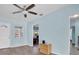 Living Room with light wood floors and view to another room at 4825 Dr Martin Luther King Jr S St, St Petersburg, FL 33705