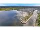 Community aerial view showcasing waterfront location and homes at 4851 W Gandy Blvd # B6 L3, Tampa, FL 33611