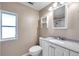Clean bathroom with single vanity, toilet, and shower at 4851 W Gandy Blvd # B6 L3, Tampa, FL 33611
