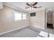 Bright bedroom with ceiling fan and carpet at 4851 W Gandy Blvd # B6 L3, Tampa, FL 33611