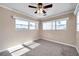 Spacious bedroom with ceiling fan and carpet at 4851 W Gandy Blvd # B6 L3, Tampa, FL 33611