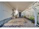 Covered carport with brick pavers and lattice walls at 4851 W Gandy Blvd # B6 L3, Tampa, FL 33611