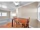 Simple dining area with wood table and chairs at 4851 W Gandy Blvd # B6 L3, Tampa, FL 33611