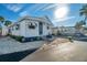 Nice Florida mobile home with carport and landscaping at 4851 W Gandy Blvd # B6 L3, Tampa, FL 33611