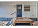 Mobile home's front door with steps and landscaping at 4851 W Gandy Blvd # B6 L3, Tampa, FL 33611