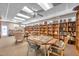 Well-lit community library featuring books and game tables at 4851 W Gandy Blvd # B6 L3, Tampa, FL 33611