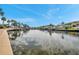 Scenic community canal view with boat docks and lush tropical landscaping at 4851 W Gandy Blvd # B6 L3, Tampa, FL 33611