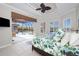 Main bedroom with pool views and a king-size bed at 5076 La Costa Island Ct, Punta Gorda, FL 33950