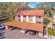 Condo building with covered parking and lush landscaping at 511 Duxbury Ct # C, Safety Harbor, FL 34695