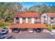 Condo building showcasing covered parking and landscaping at 511 Duxbury Ct # C, Safety Harbor, FL 34695