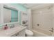 Clean bathroom, featuring a bathtub, toilet and updated vanity at 511 Duxbury Ct # C, Safety Harbor, FL 34695