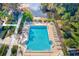 Community pool with plenty of lounge chairs for relaxing at 511 Duxbury Ct # C, Safety Harbor, FL 34695